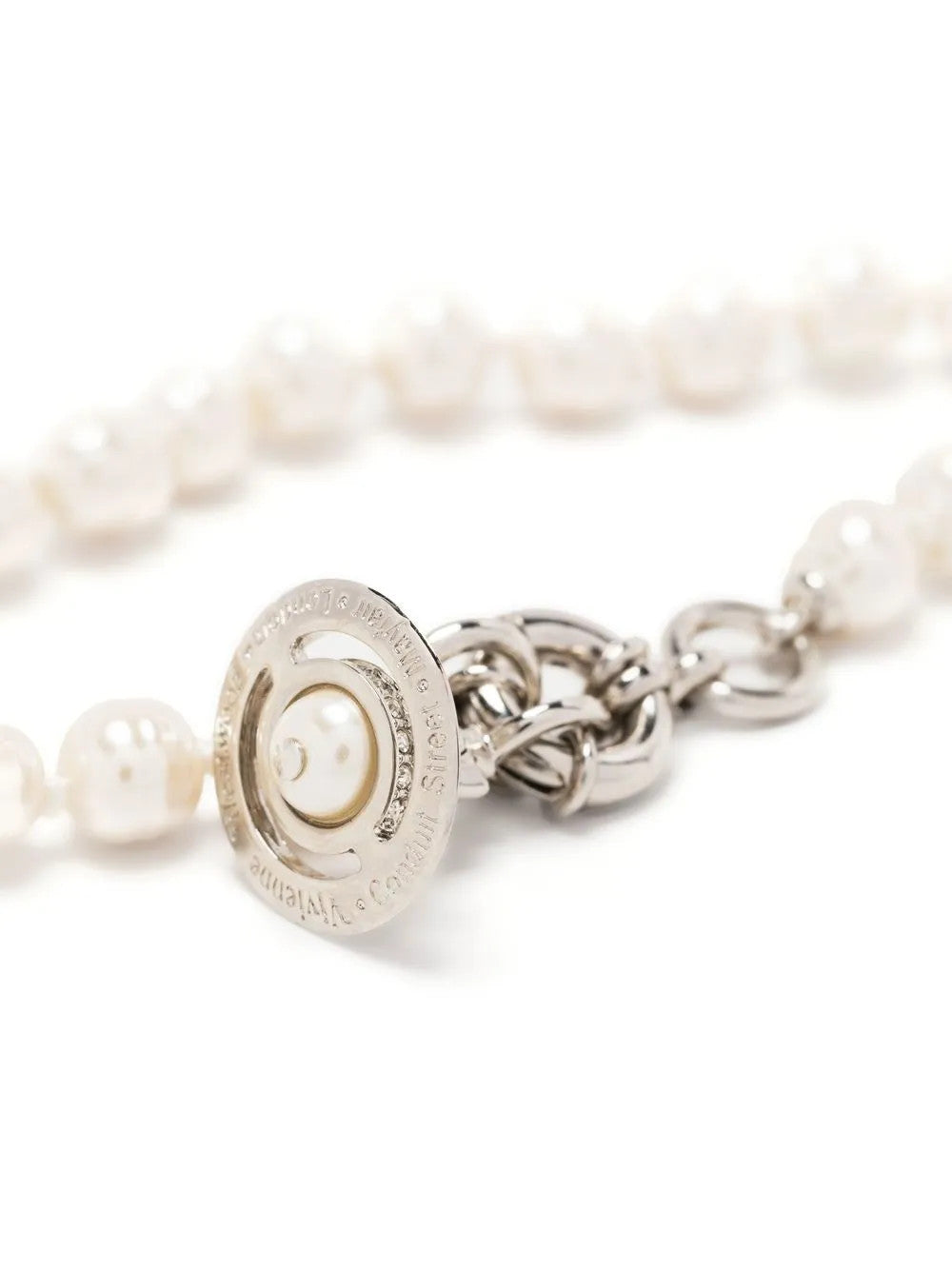 Close up of White jewelry, showing detail