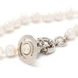 Close up of White jewelry, showing detail