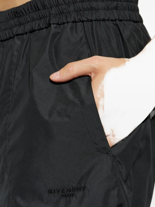 Close up of Black pants, showing texture of the 65% cotton/ 35% polyester fabric