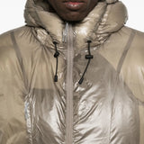 Close up of tan jackets, showing texture of the polyester fabric