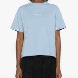 blue t-shirt worn by a person, showing the t-shirt fit