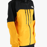 Yellow jacket worn by a person, showing the jacket's fit