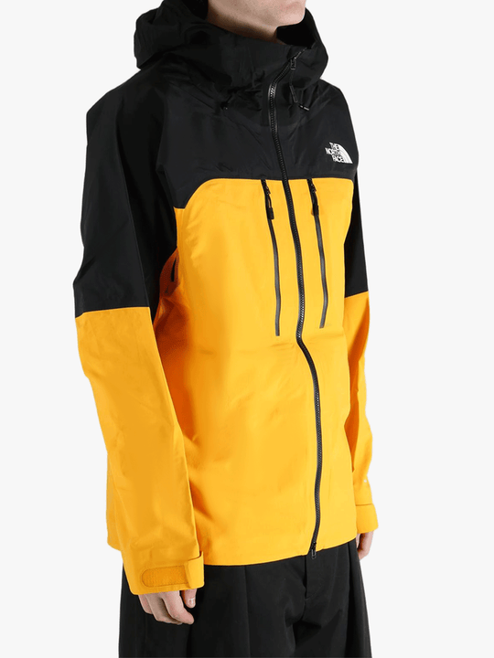 Yellow jacket worn by a person, showing the jacket's fit