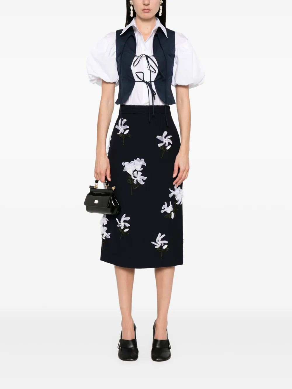 Navy skirt worn by a person, showing the skirt's fit