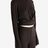 brown sweater worn by a person, showing the sweater fit