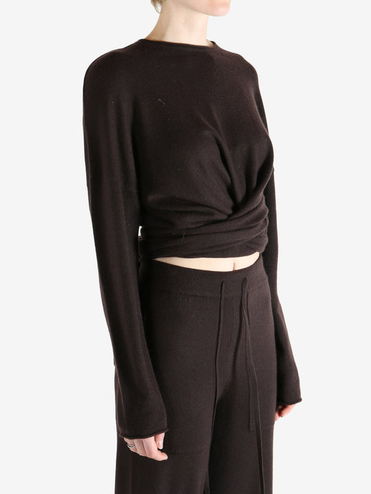 brown sweater worn by a person, showing the sweater fit