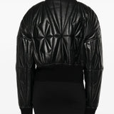 Black jackets worn by a person, showing the jackets fit