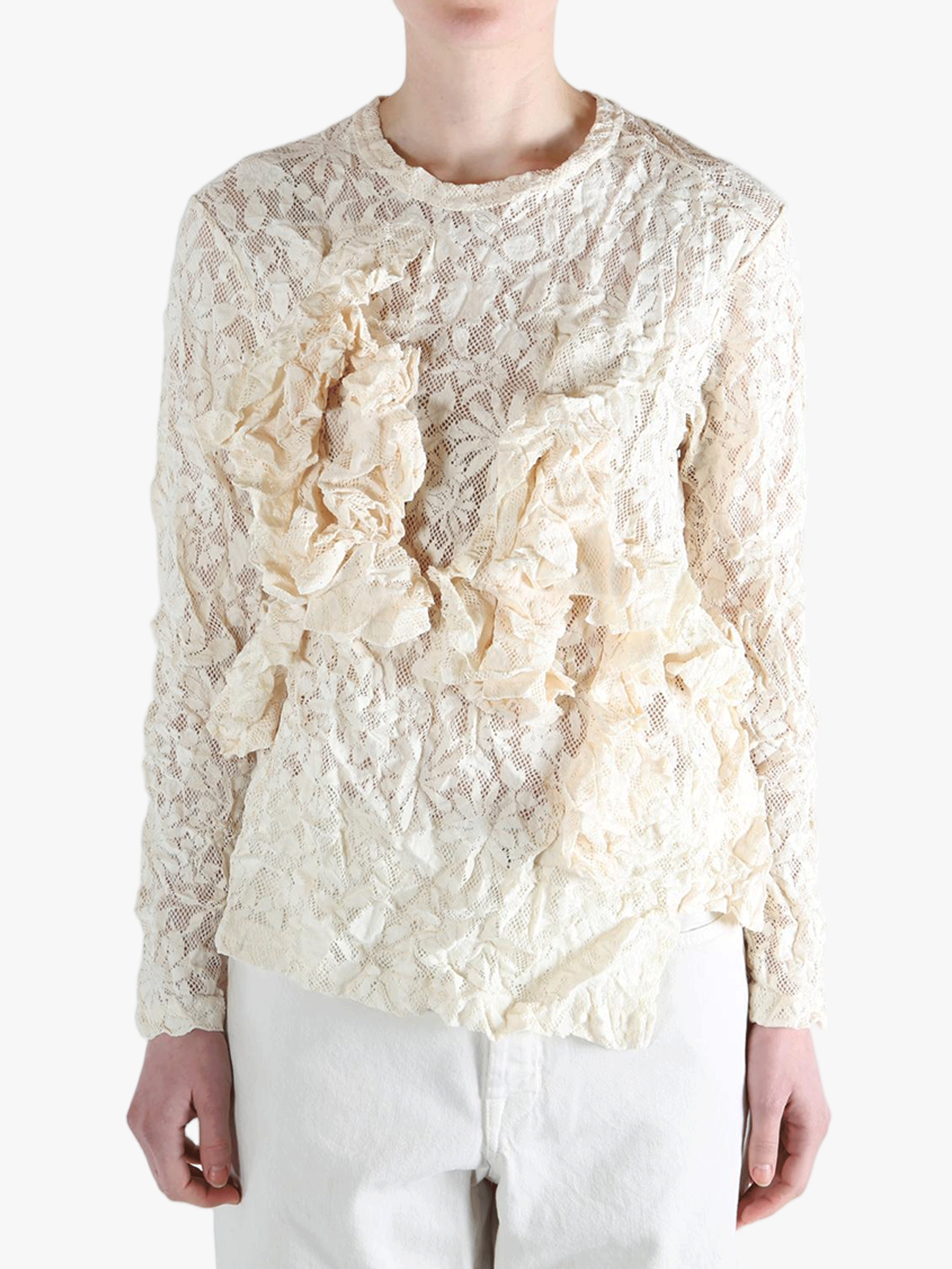 White shirt worn by a person, showing the shirt's fit