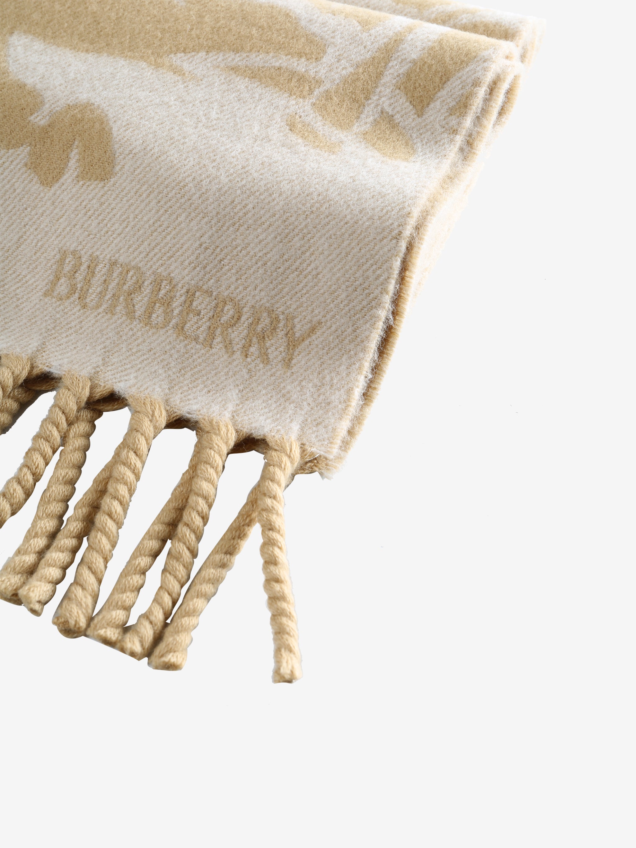 Close up of beige scarf,showing texture of the wool fabric