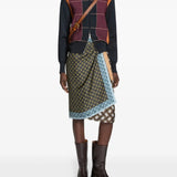 Brown boots worn by a person, showing the boots' fit