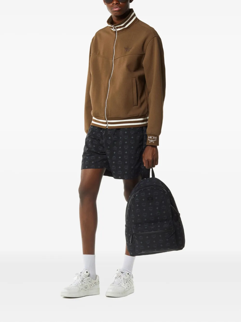 Black bag worn by a person, showing the bag's fit