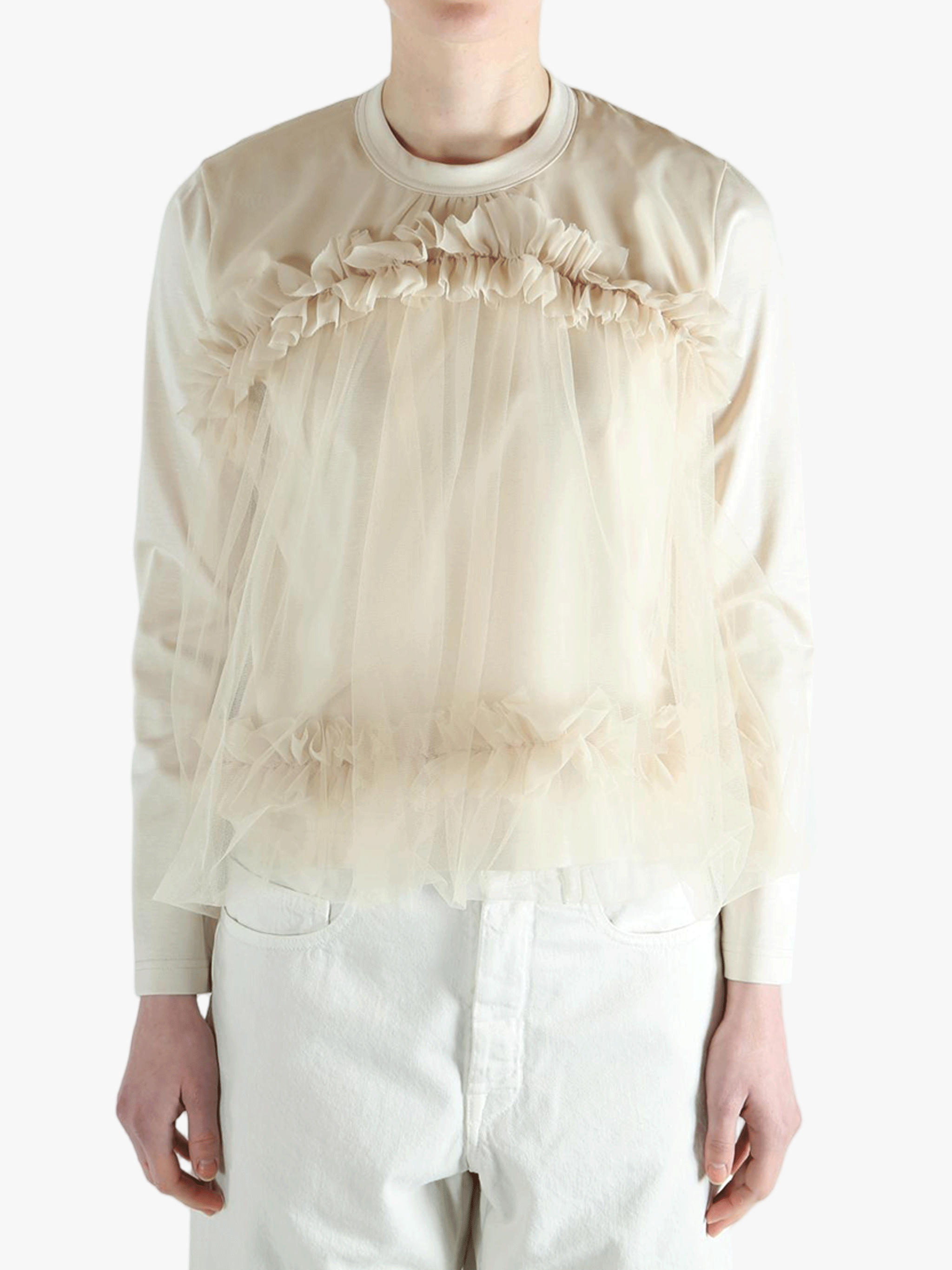 Tan t-shirts worn by a person, showing the t-shirts fit