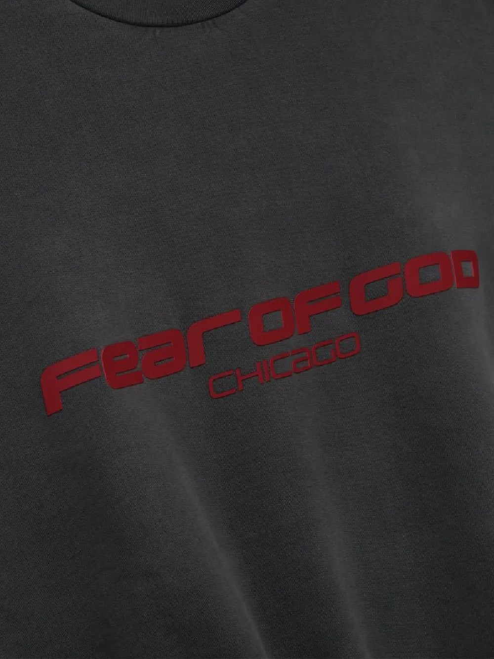 Close up of the grey sweatshirt, showing texture of the cotton fabric