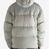 Grey jacket worn by a person, showing the jacket's fit