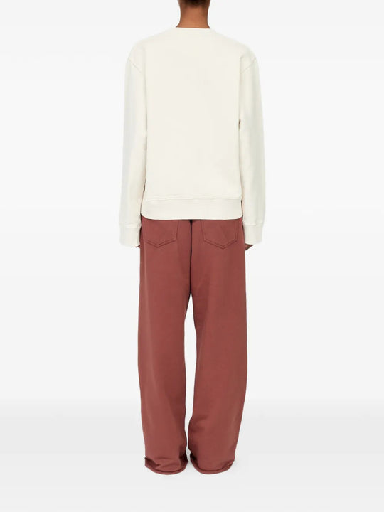 Tan knitwear, full body view