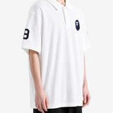 White t-shirt worn by a person, showing the t-shirt fit