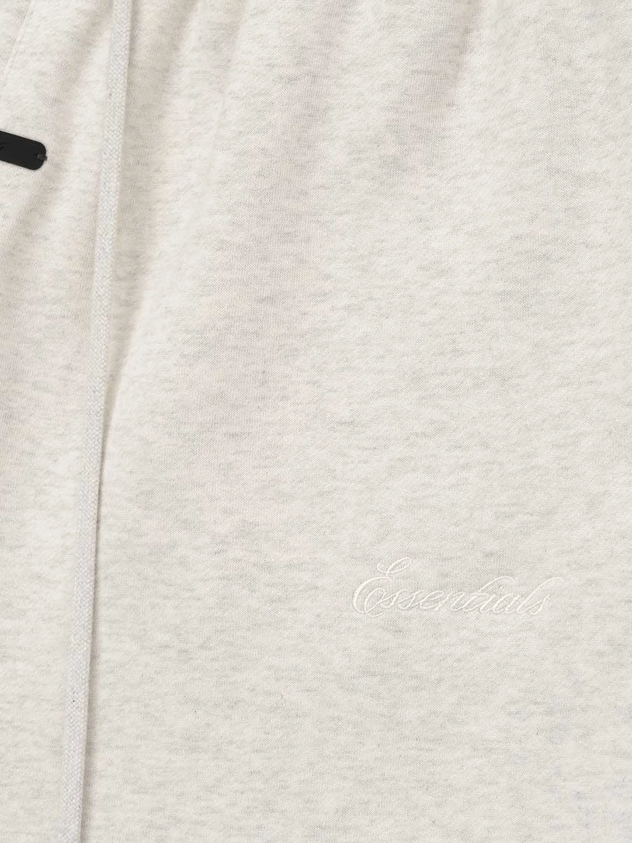 Close up of white shorts, showing texture of the Cotton and Polyester fabric