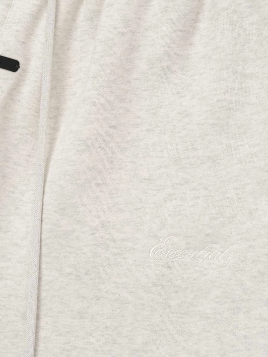 Close up of white shorts, showing texture of the Cotton and Polyester fabric