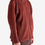 Red hoodies worn by a person, showing the hoodie's fit