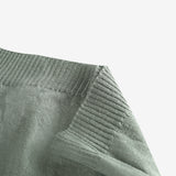 Close up of tan hats, showing texture of the wool fabric