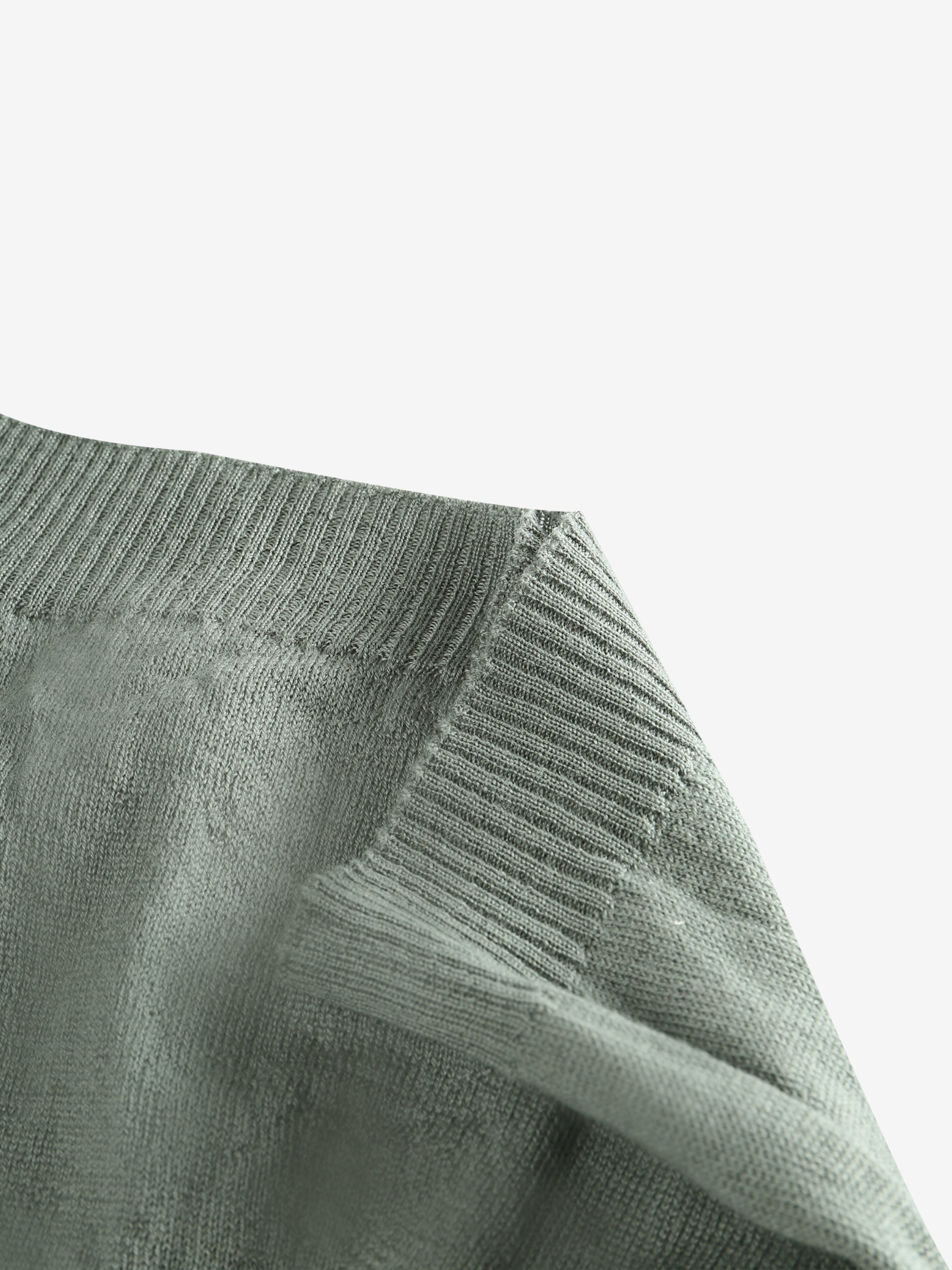 Close up of tan hats, showing texture of the wool fabric