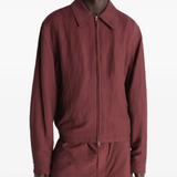 Red jacket worn by a person, showing the jacket's fit