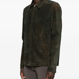 Green jacket worn by a person, showing the jacket's fit