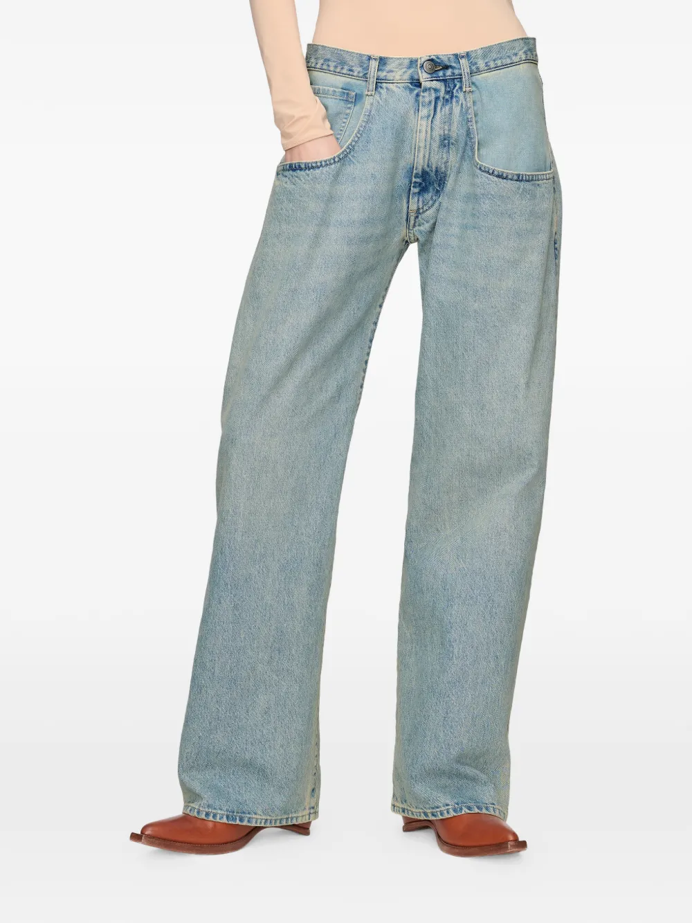 Blue jeans worn by a person, showing the jeans fit