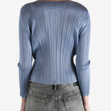 Blue top worn by a person, showing the top's fit