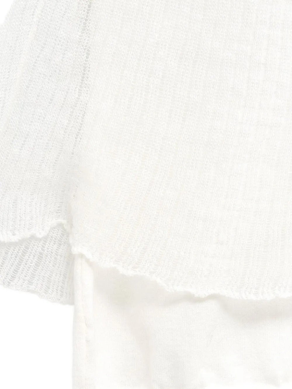 Close up of White top, showing texture of the 100% cotton fabric