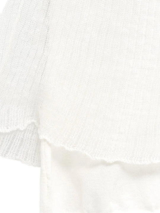 Close up of White top, showing texture of the 100% cotton fabric