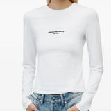 White t-shirt worn by a person, showing the t-shirt fit
