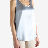 Grey t-shirts worn by a person, showing the t-shirts fit