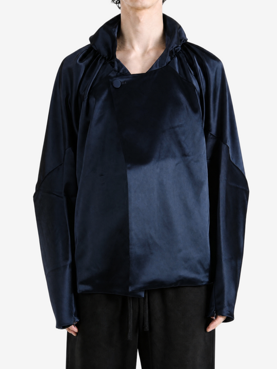 Navy jacket worn by a person, showing the jacket fit