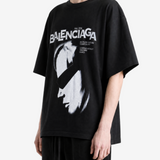 Black t-shirt worn by a person, showing the t-shirt fit