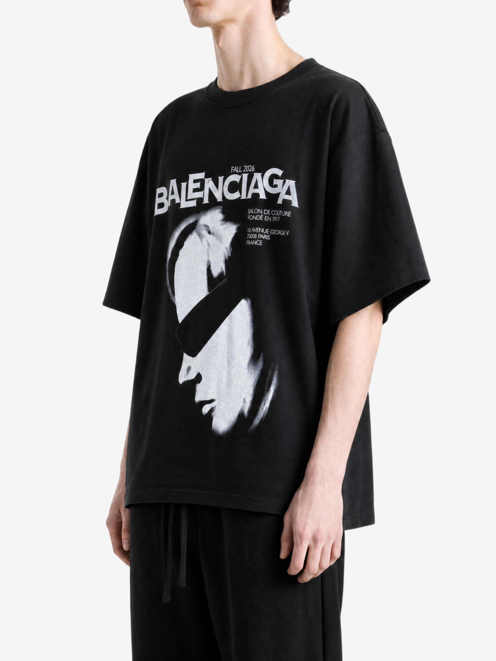 Black t-shirt worn by a person, showing the t-shirt fit