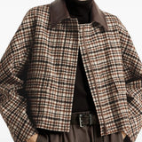 Brown jacket worn by a person, showing the jacket fit