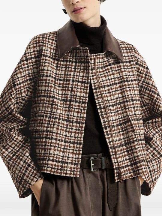 Brown jacket worn by a person, showing the jacket fit