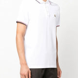 White shirt worn by a person, showing the shirt's fit