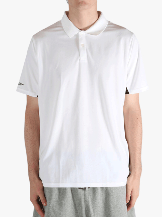 White t-shirts worn by a person, showing the t-shirts fit