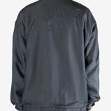 Navy jacket worn by a person, showing the jacket's fit