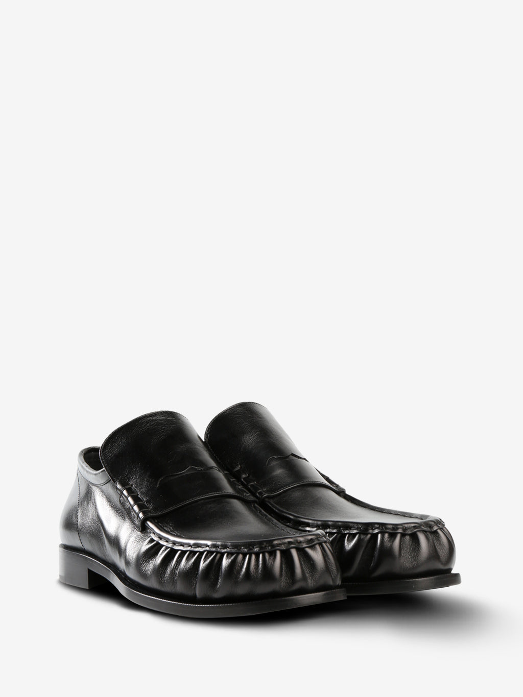 Black loafer, side view