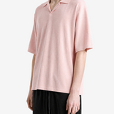Pink t-shirt worn by a person, showing the t-shirt fit