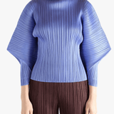 Blue shirt worn by a person, showing the shirt fit