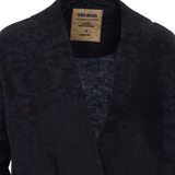 Close up of the black coats, showing texture of the blended fabric 