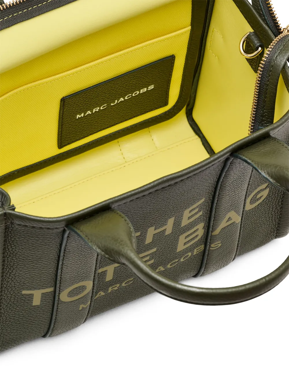 Close up of green bags, showing texture of the cow leather fabric