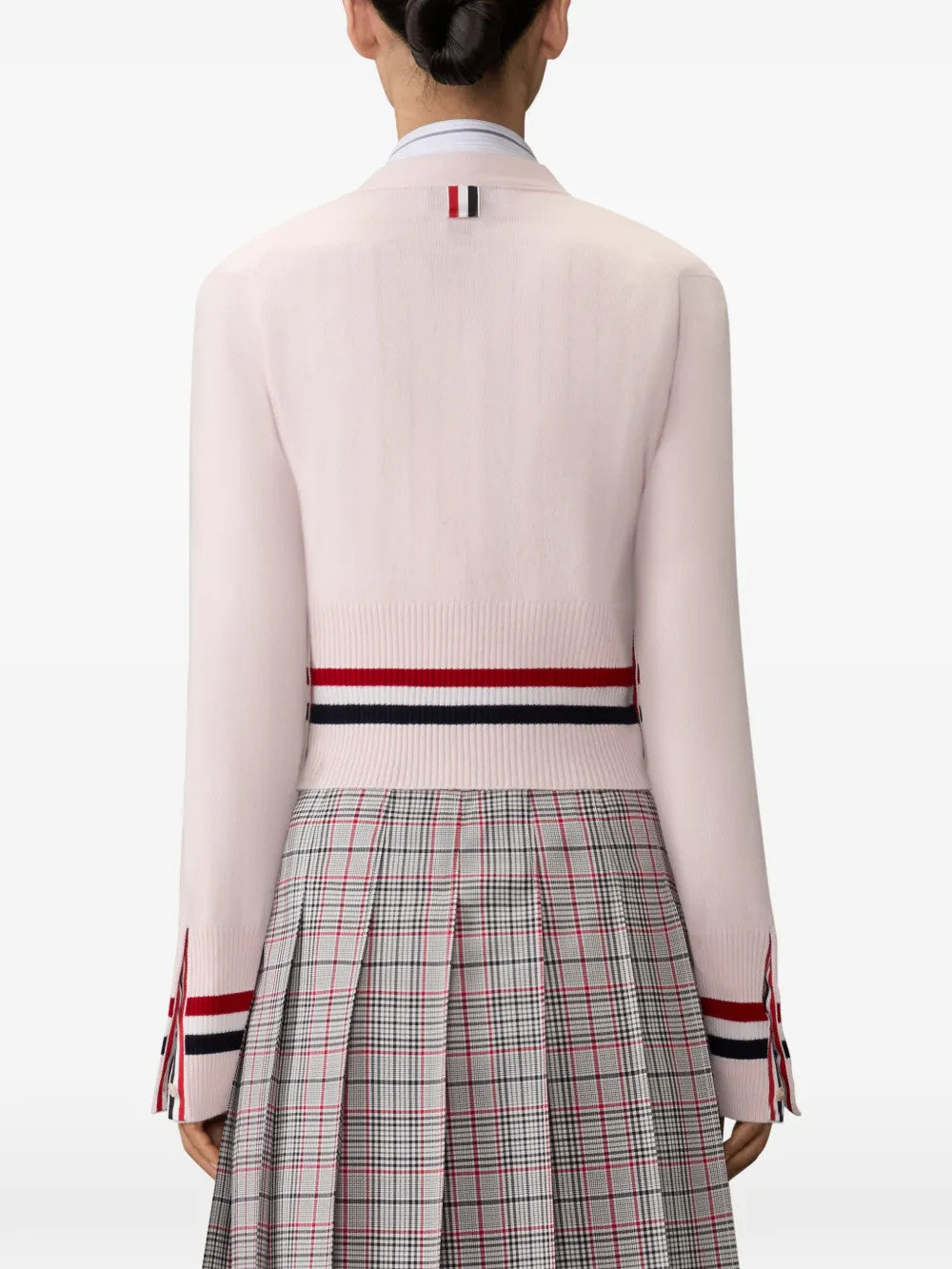 Pink knitwear, full body view