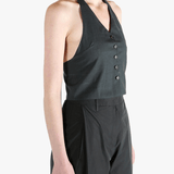 Black top worn by a person, showing the top's fit