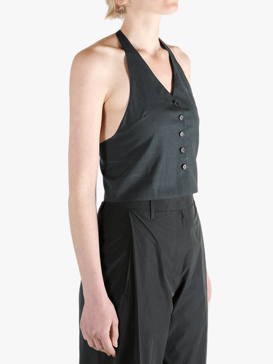Black top worn by a person, showing the top's fit