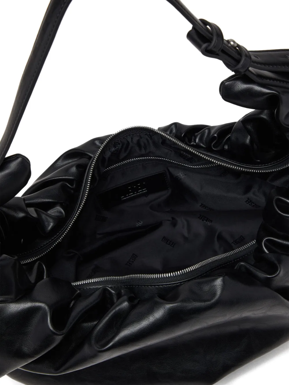 Close up of black bag,showing texture of the polyurethane fabric.